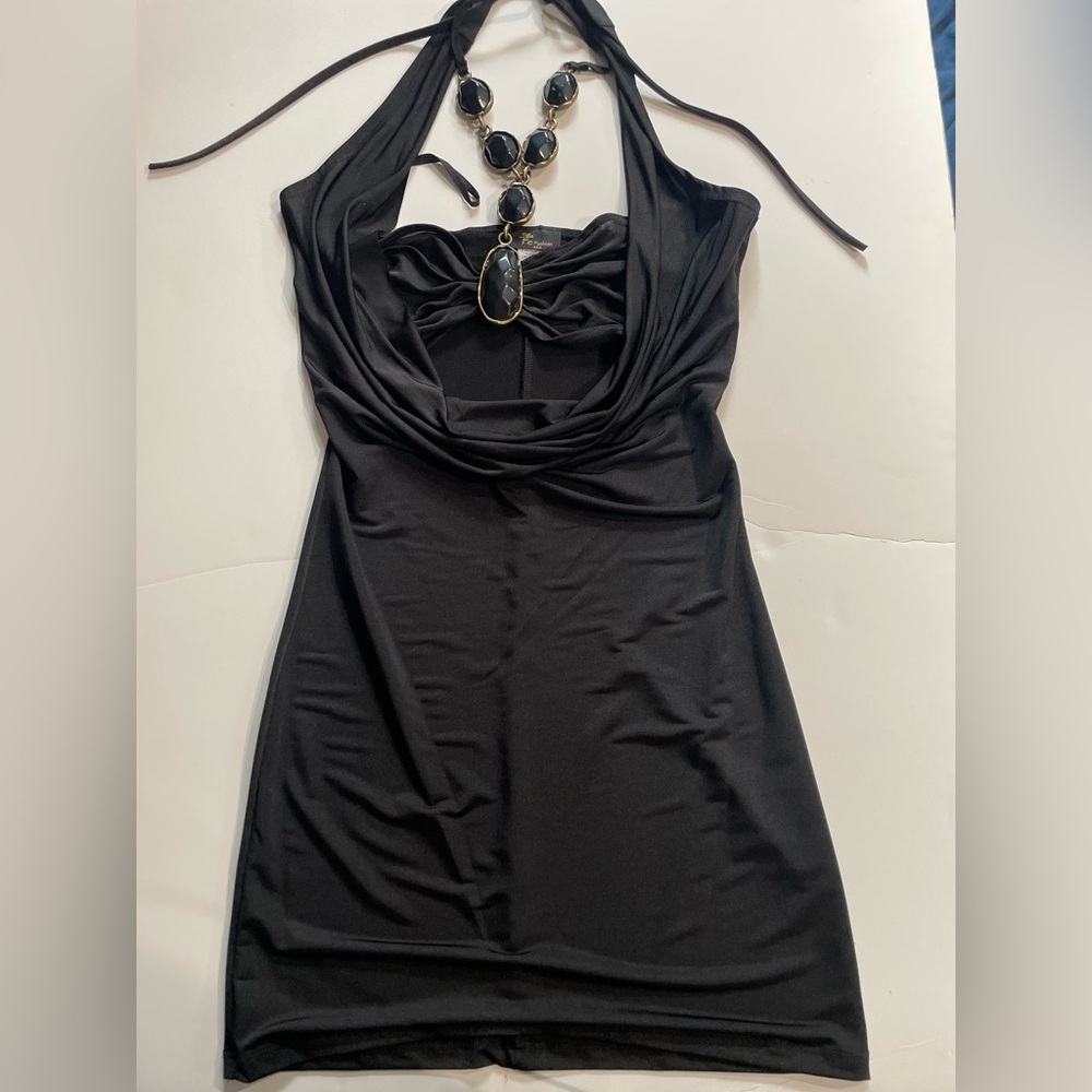 Women’s sleeveless tie up dress embellished necklace attachment.